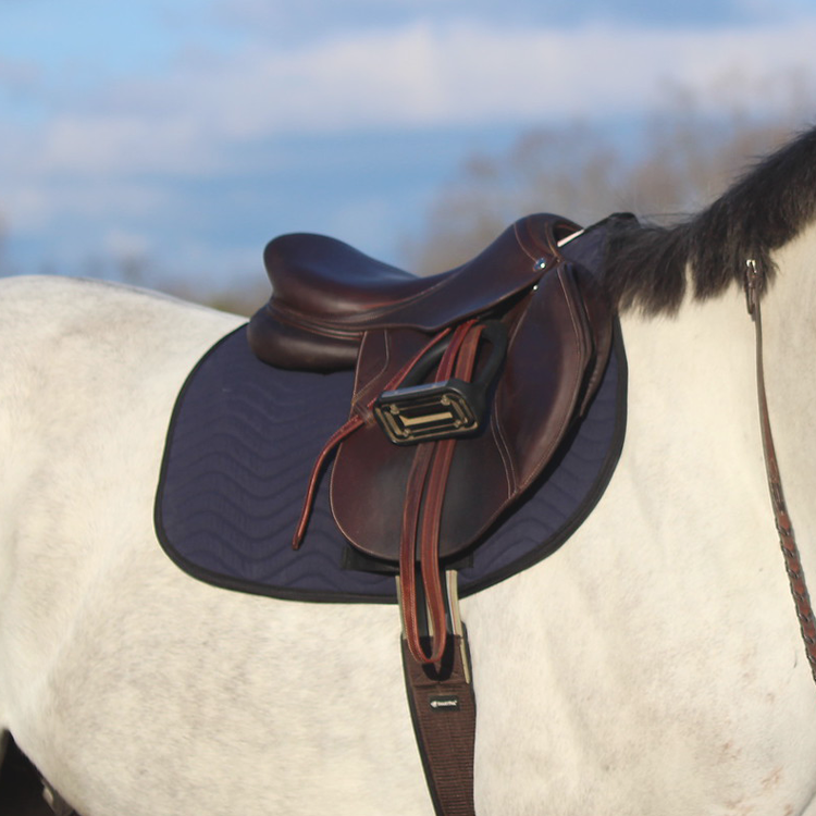 Jumper saddle pad on horse